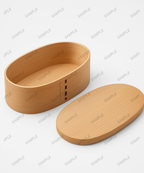 Handgefertigte Magewappa Bento-Box aus Akita-Sugi auf Holztisch